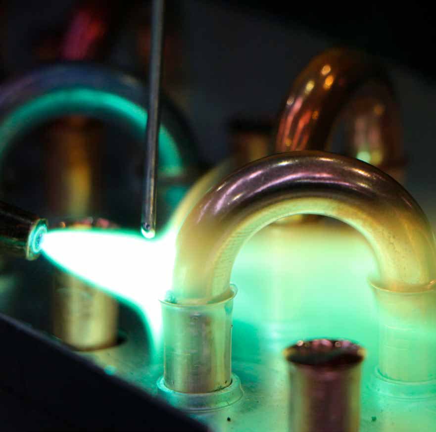 Pipe brazing during HVAC component assembly